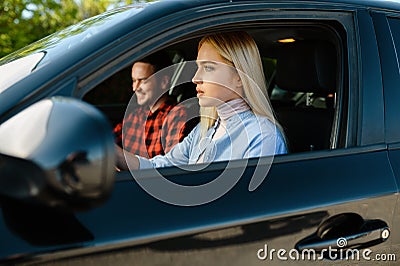 Student and male instructor in car, driving school Stock Photo