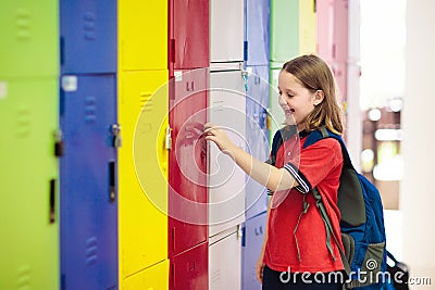 Student in school at locker. Kids in preschool Stock Photo