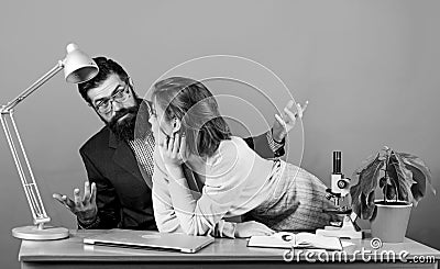 Student sensual sexy girl and experienced teacher. Resist temptation. Stop harassment. Breaking rules. Teacher and Stock Photo