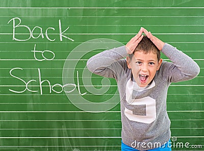 Student shows a board with the inscription: Back to School Stock Photo