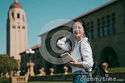 Student visiting her dream university. Stock Photo