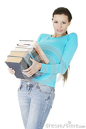 Student woman holding heavy books Stock Photo