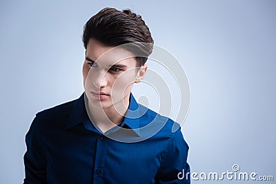 Handsome young man looking sideways Stock Photo
