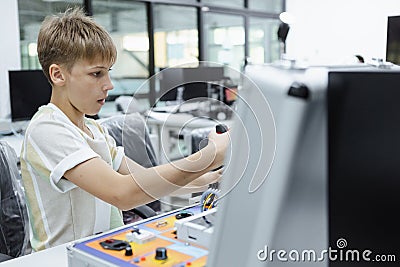 Students boy learning electrical appliances. education on table at class room, Robotics learning innovation. electric system skill Stock Photo