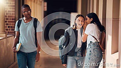 Students, bullying and whisper to gossip in school about sad boy, racism victim and social outcast. Girls gossiping Stock Photo