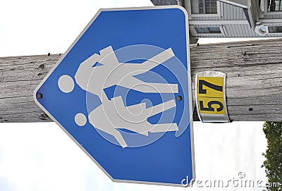 Students crossing the street sign Stock Photo