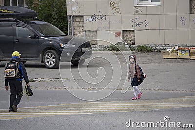 The students crossing the Zebra on the street in Berezniki, Russia, on 4 September Editorial Stock Photo