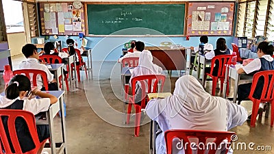 Students having exam in Malaysia Editorial Stock Photo