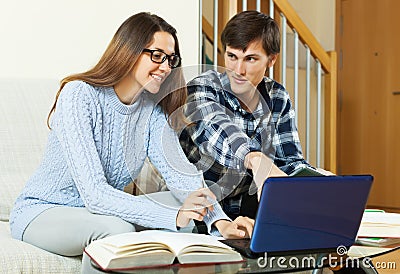 Students with laptop preparing for examinations a Stock Photo