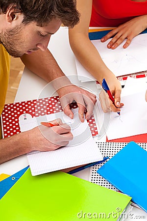 Students making notes Stock Photo