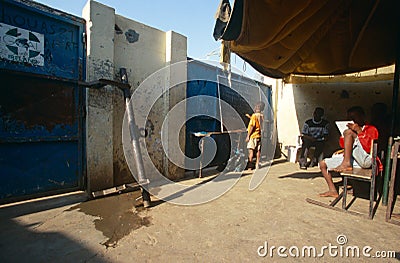 Students studying in a makeshift classroom, Angola Editorial Stock Photo