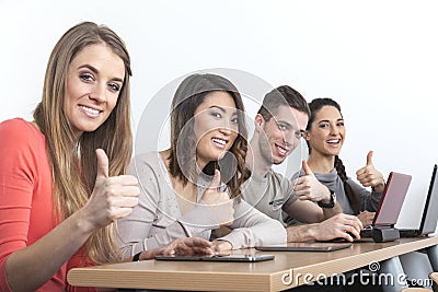 Students thumbs up Stock Photo