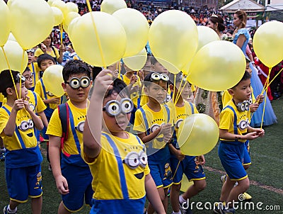 Students wear minions custume in Christmas Fair 2015 Editorial Stock Photo