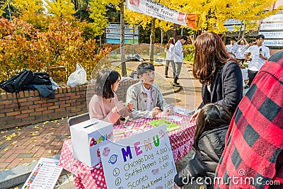 Students of Woosong College sell food tickets Editorial Stock Photo