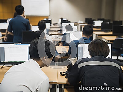 Students working together in computer room during lecture class seminar. Editorial Stock Photo