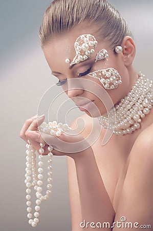 Studio beauty portrait with pearl necklace Stock Photo