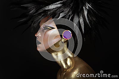 Studio beauty portrait of young woman with black graphic makeup Stock Photo