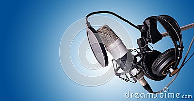 Studio condenser microphone and equipment blue Stock Photo