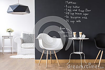 Studio flat with blackboard wall Stock Photo