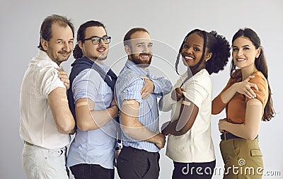 Studio group portrait of happy diverse people showing arms after getting vaccine Stock Photo