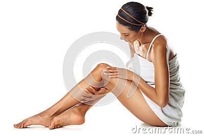 Studio, legs and body of woman on floor with skincare, spa beauty and self care marketing mockup. Dermatology, aesthetic Stock Photo