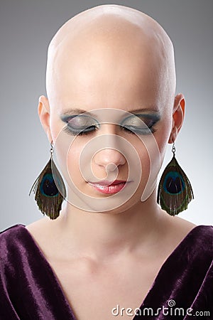 Studio portrait of bald woman Stock Photo