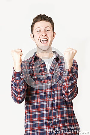 Studio Portrait Of Man With Jubilant Expression Stock Photo