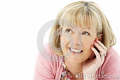 Studio Portrait of Smiling Mother Stock Photo