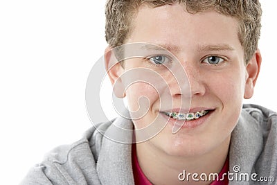 Studio Portrait of Smiling Teenage Boy Stock Photo