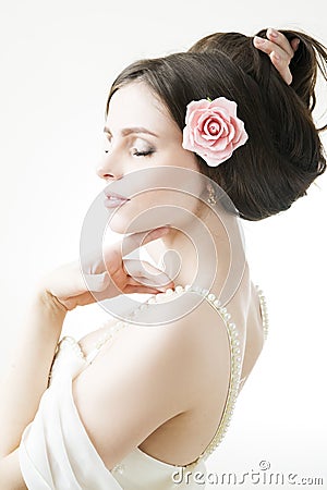 Studio portrait of a young beautiful bride in a white dress Stock Photo