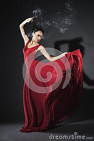Studio portrait of young dancing woman Stock Photo