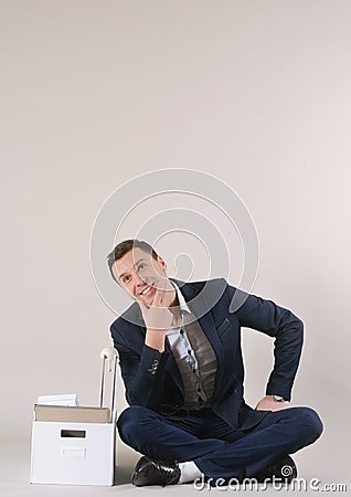 Studio shot of attractive positive thinking businessman with off Stock Photo