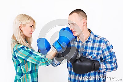 Studio shot of a beautiful funny couple expressive fighting. Stock Photo