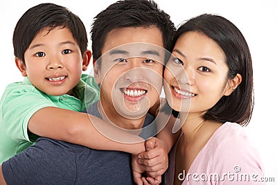 Studio Shot Of Chinese Family Stock Photo