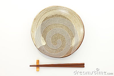 Empty Japanese dish with chopsticks Stock Photo