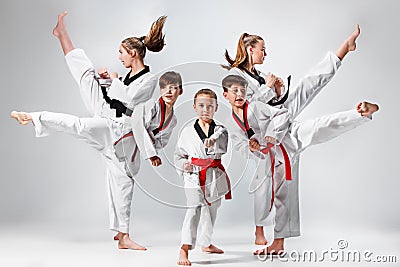 The studio shot of group of kids training karate martial arts Stock Photo