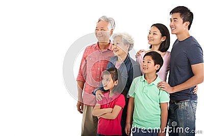 Studio Shot Of Multi-Generation Chinese Family Stock Photo