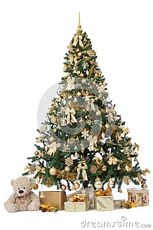 Studio shot of a richly decorated christmas tree with golden ornaments isolated on a white background with a presents Stock Photo