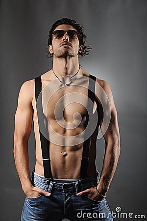 Studio shot of a shirtless man Stock Photo