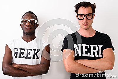 Studio shot of young black African Geek man with European Nerd m Stock Photo