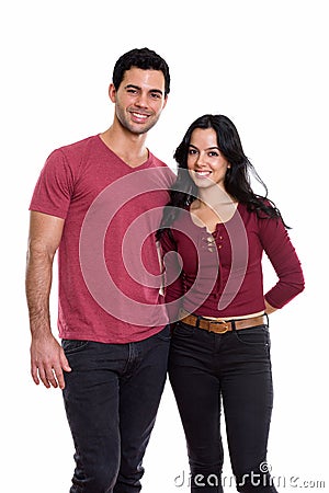 Studio shot of young happy couple smiling and in love Stock Photo