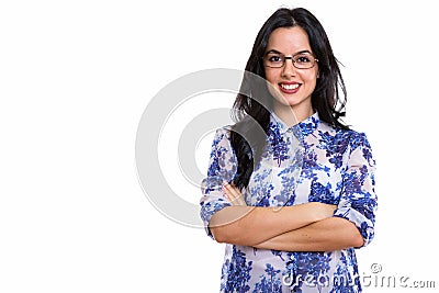 Studio shot of young happy Spanish businesswoman smiling while Stock Photo