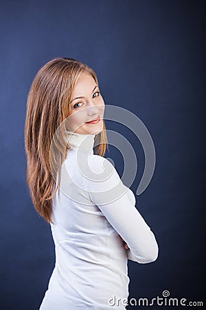 Studio shot of young smiling woman Stock Photo