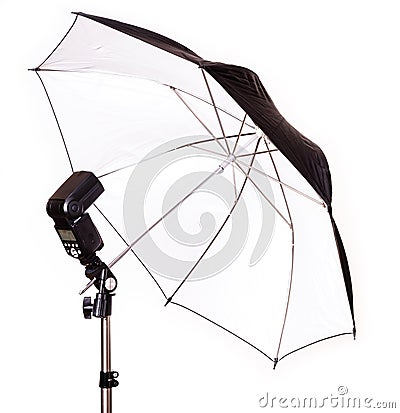 Studio strobe with umbrella isolated Stock Photo