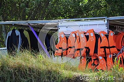 Studland, Dorset, England - June 01 2018: Racks of orange life j Editorial Stock Photo