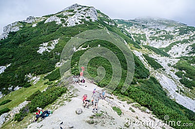Studor pass, Julian alps, Slovenia - Avgust 18, 2012: Hikers res Editorial Stock Photo
