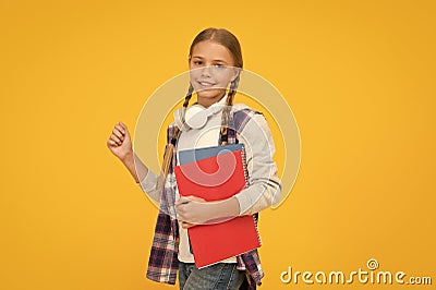 Study lessons for exam. find inspiration in music. Enjoying elearning. modern education concept. little girl in Stock Photo