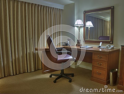 Study room with armchair lamp and mirror Stock Photo