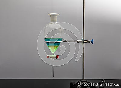 The study Separating by filtration the component substances from liquid mixture in Lab. Separating natural product use Stock Photo
