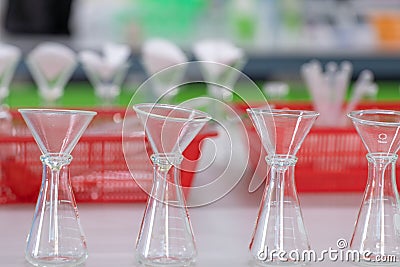 The study Separating by filtration the component substances from liquid mixture. Stock Photo